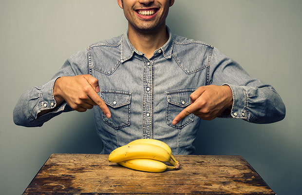 bigstock-Man-Pointing-At-Bananas-At-Old-57603566